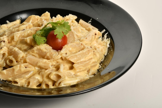 a plate of pasta with delicious alfredo sauce, delicious fast food meals, Arabic restaurants.