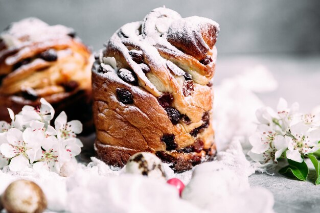 A plate of pastries with a cherry on the top