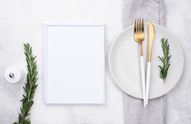 Plate with cutlery and frame