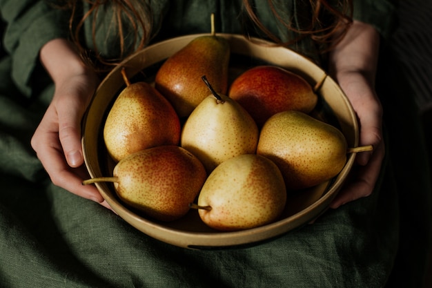 A plate with a fresh harvest of pears