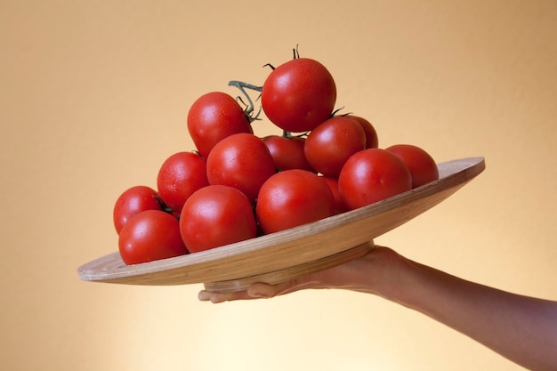 Plate with fresh tomatoes