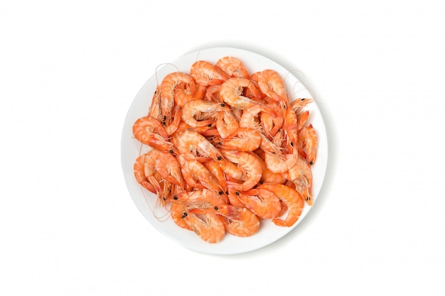 Plate with shrimps isolated on white background