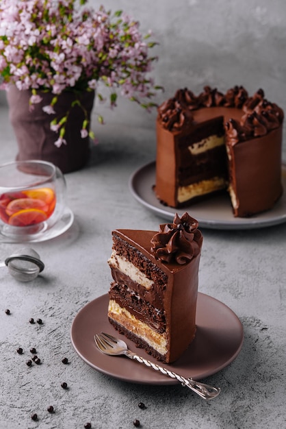 Plate with slice of tasty homemade chocolate cake