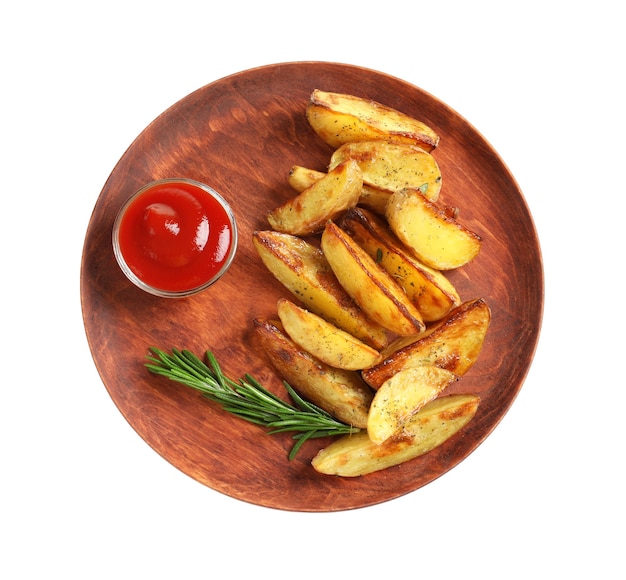 Plate with tasty potato wedges and tomato sauce