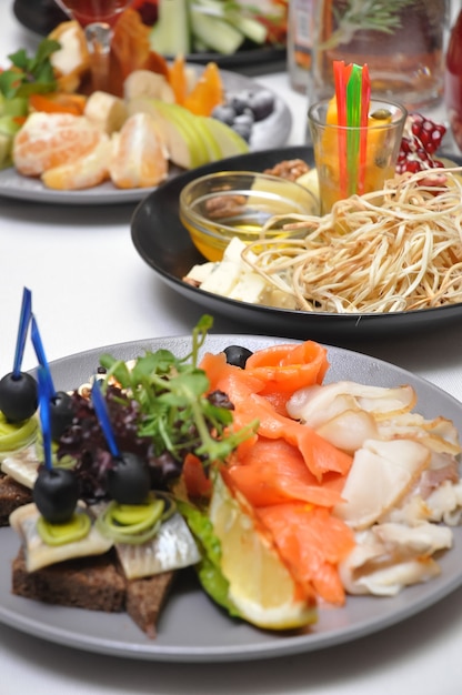 Plates with tasty appetizers at a Banquet in a restaurant