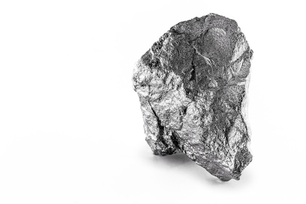 Platinum nugget on an isolated white surface