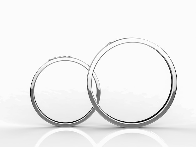 Platinum wedding rings on white background