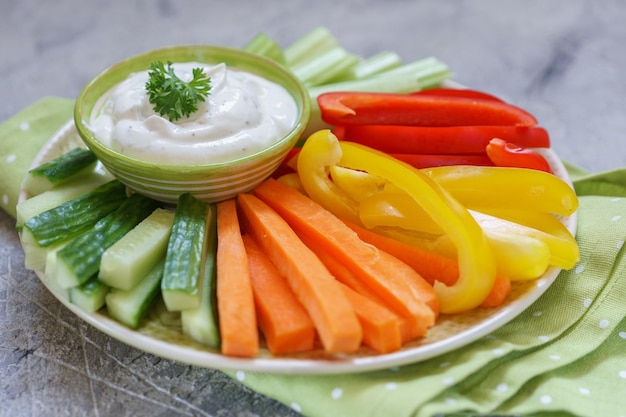 Platter of assorted fresh vegetables with ranch dip