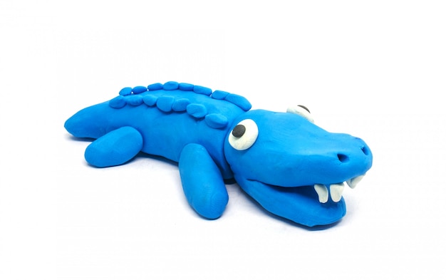 Photo play doh crocodile on white background