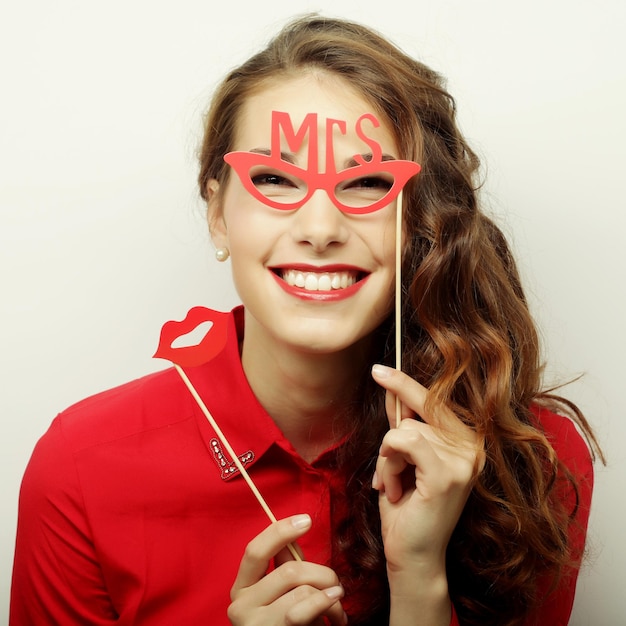 Playful young woman ready for party