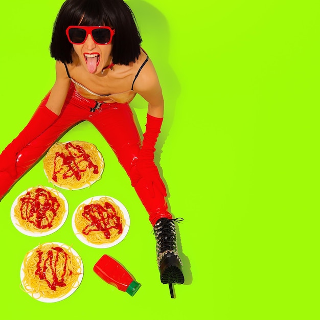 Playfull Party Girl with xApasta bolnese at green background Minimal fast food creative art