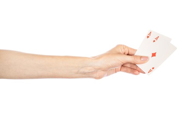 Playing cards in hand isolated on white background