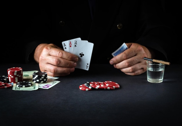 Playing cards with a winning combination of three of a kind or set in a player's hand