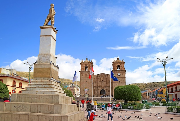 Plaza de Armas Square with the Monument of Colonel Francisco Bolognesi Cervantes in Puno Peru