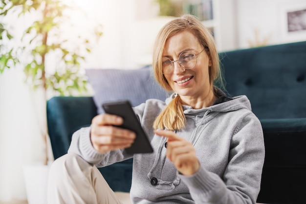 Pleasant caucasian woman in eyewear and