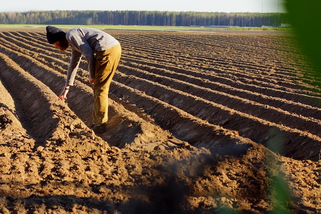 A plowed field Creating a furrow in an arable field preparing for planting crops in the spring