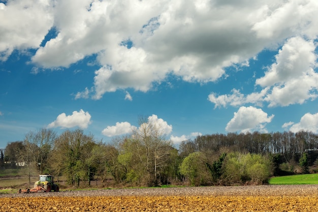 Plowed field with a tractor