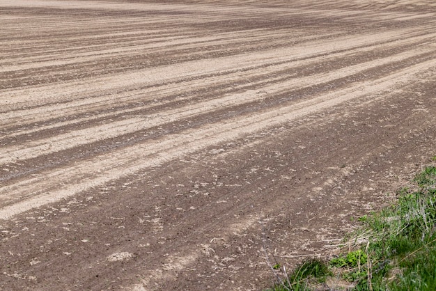 Plowed soil in an agricultural field during tillage