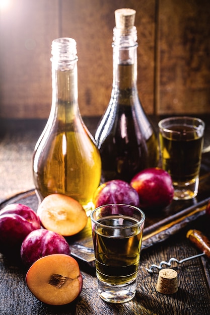 Photo plum liqueur, alcoholic drink with traditional plum from the middle east and asia