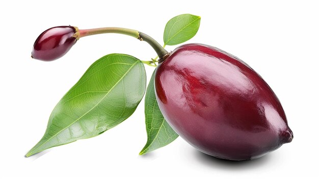 a plum with a leaf on it is on a white background