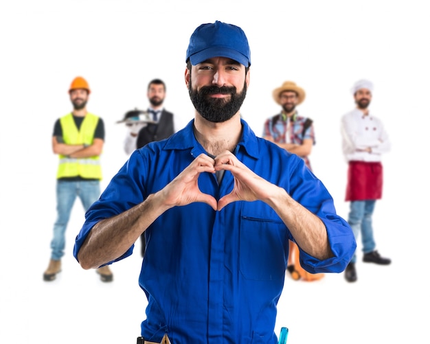 Plumber making a heart with his hands