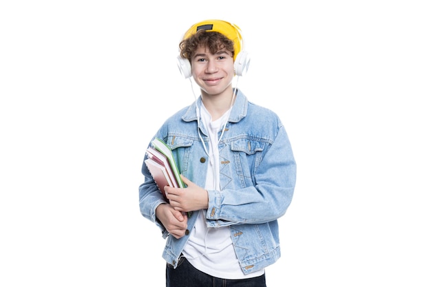 PNG of teenage boy in headphones with books isolated on white background