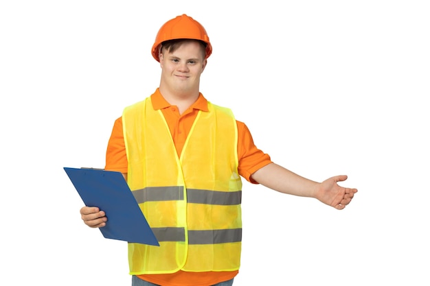 PNGsmiling young man with down syndrome in work uniform with hard hat on his headisolated on white background