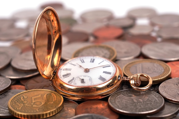 Pocket watch and coin