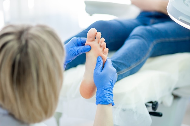 Podiatry doctor treating feet and nails