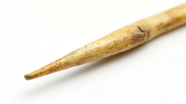 Pointed wooden tool with conical tip for crafting or carving