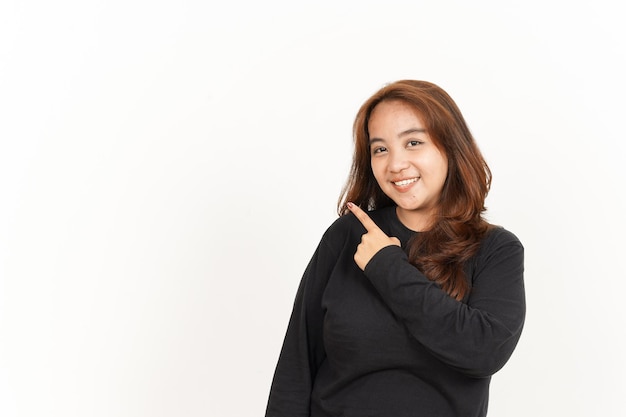 Pointing Aside Of Beautiful Asian Woman Wearing Black Shirt Isolated On White Background