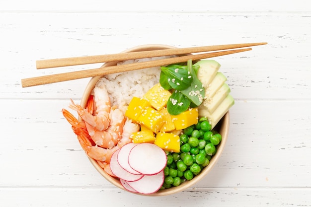 Poke bowl with shrimps avocado and mango