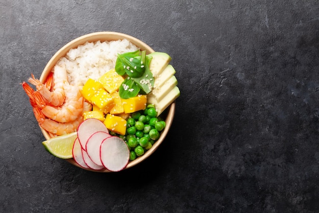 Poke bowl with shrimps avocado and mango