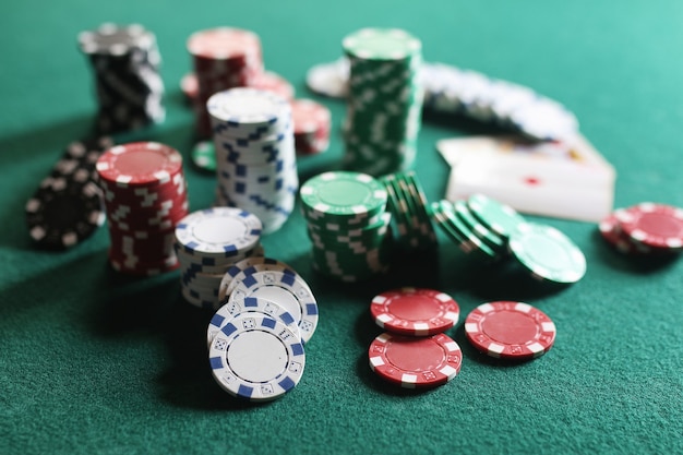 Poker chips and cards on the cloth