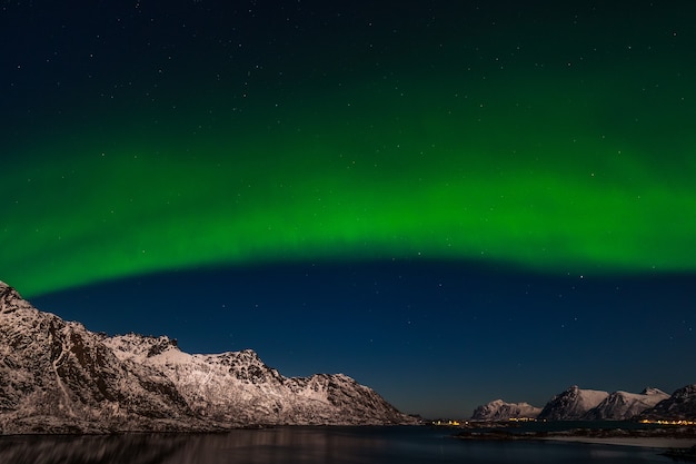 The polar arctic Northern lights hunting aurora borealis sky star in Norway travel photographer mountains