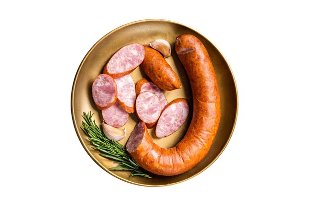 Photo polish smoked sausage in a steel plate isolated on white background