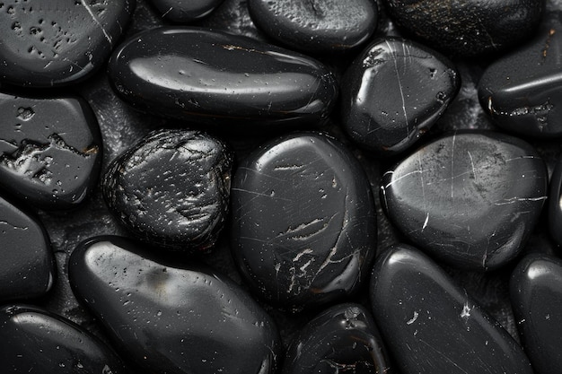 Photo polished black tourmaline minerals are arranged showing texture and natural patterns