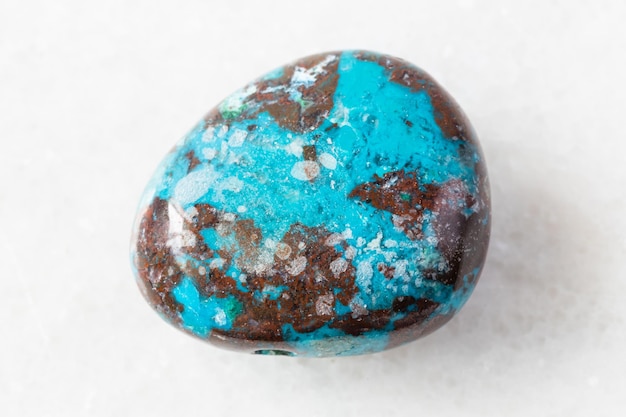 Polished Chrysocolla with Cuprite rock on white