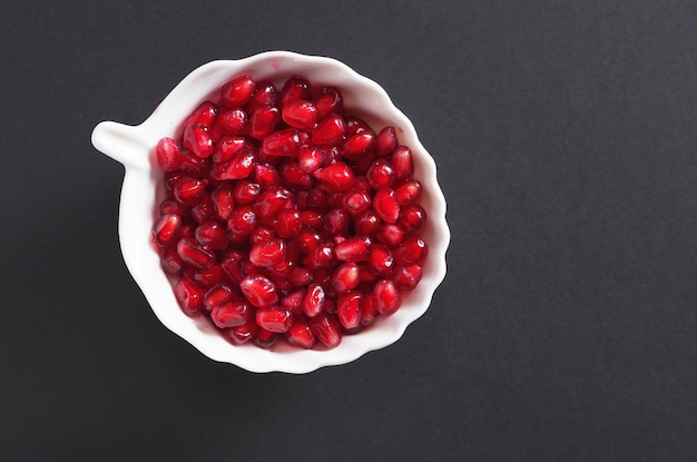 Pomegranate grains in bowl