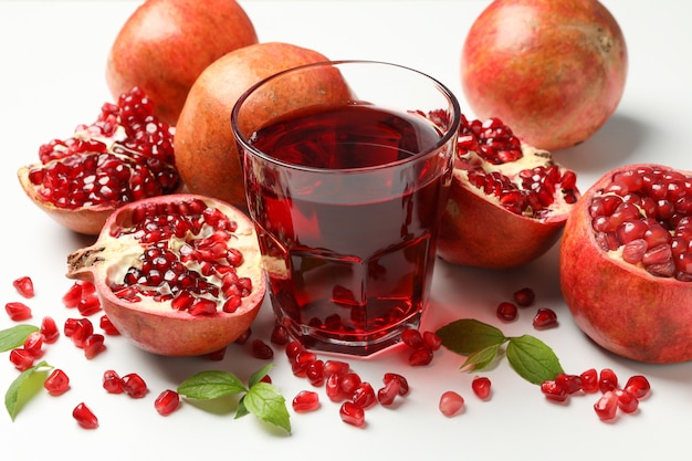 Pomegranate, juice and seeds, close up