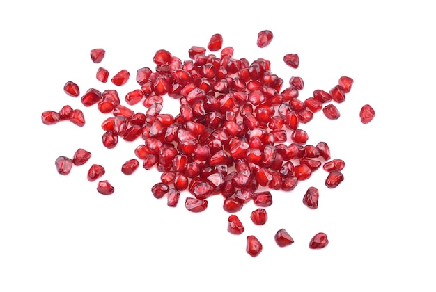 Pomegranate seeds isolated on white background