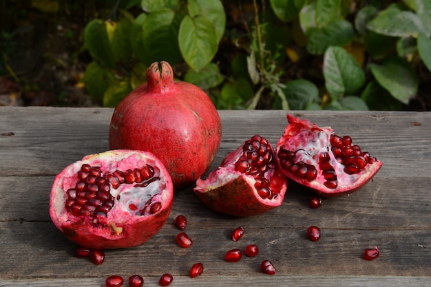 Pomegranates on a wooden table