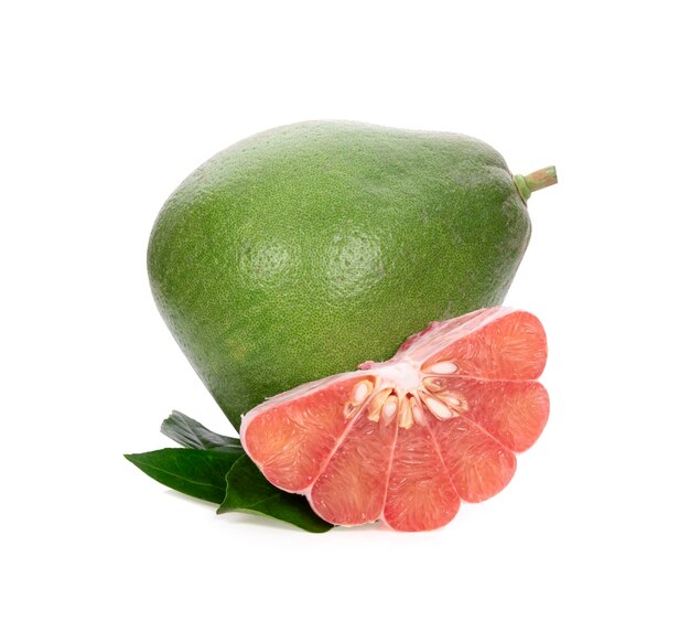 Pomelo citrus fruit with leaves isolated on white