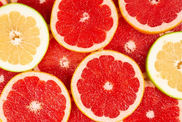 Pomelo and grapefruit slices background