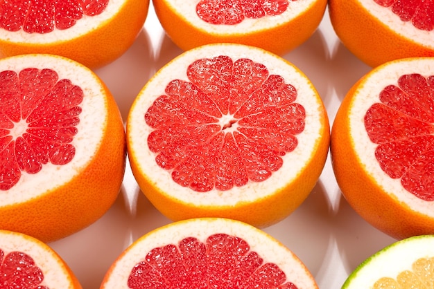 Pomelo and grapefruit slices background