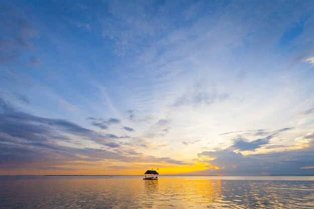 Pontoon floating on the water at sunset background