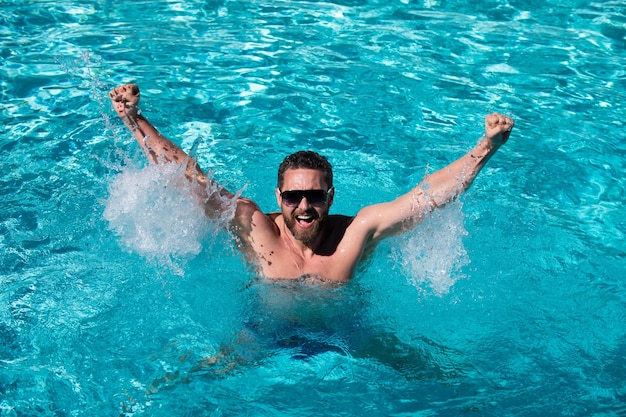 Pool party Summer resort Vacation and free time Handsome man in swimming pool