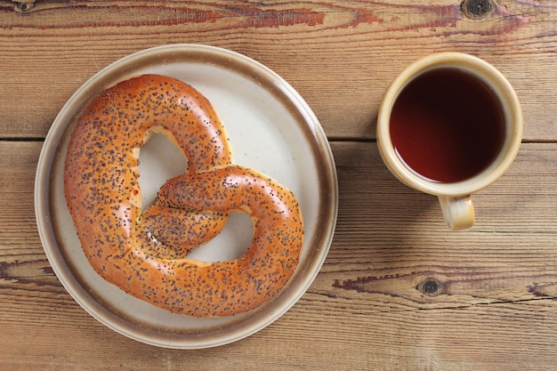 Poppy pretzel and tea cup