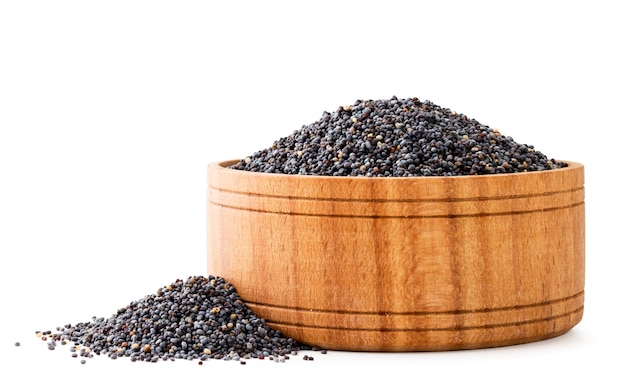 Poppy in a wooden plate close-up on a white background with a heap of poppy seeds. Isolated