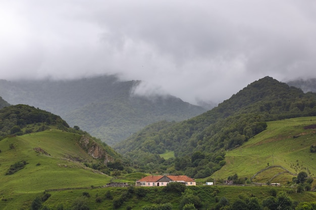 Populated valley in the North Caucasus in Russia. Houses among the hills and mountains.